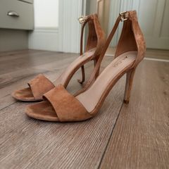 Brown heeled leather sandals