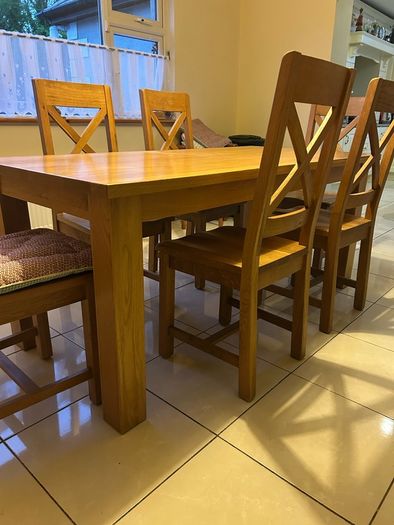 Solid oak dining table with 6 chairs