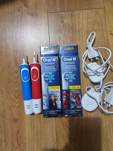 Oral b kids electric toothbrush x 2,brand new 8 heads and two charger