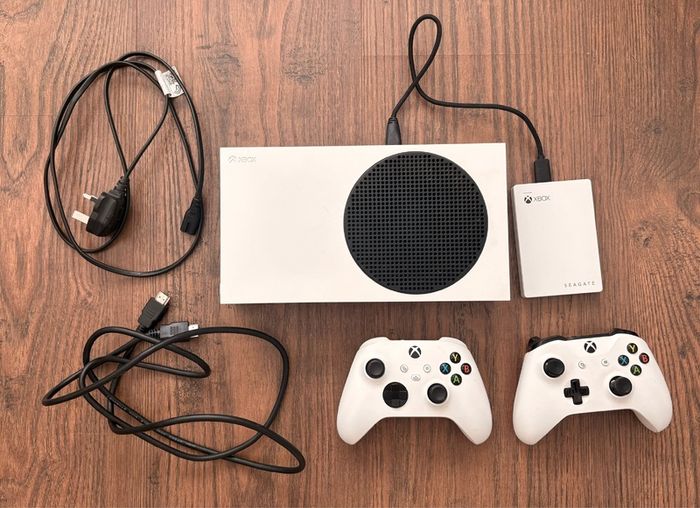 Xbox Series S with Xbox official Seagate 2TB game drive and two Xbox controllers