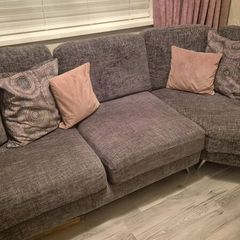 Grey corner couch with 6 matching cushions