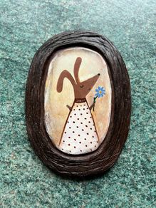 Charming handmade clay wall art