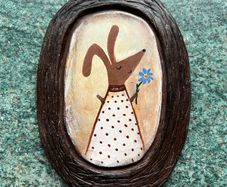 Charming handmade clay wall art