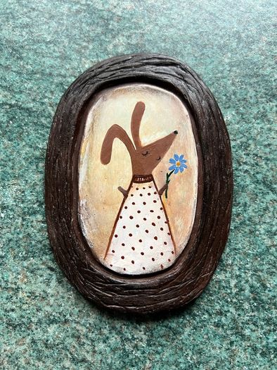 Charming handmade clay wall art