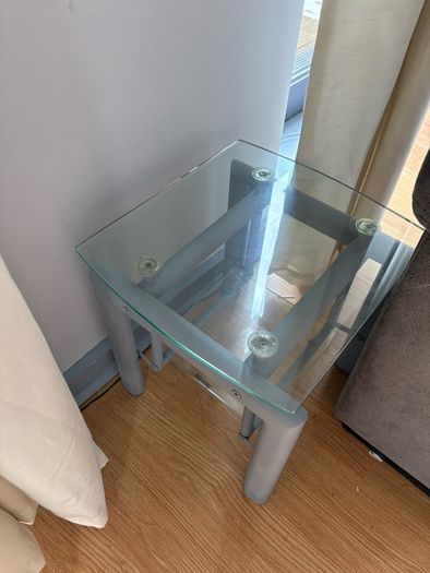 two glass side tables and one glass coffee table