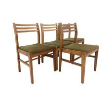 Four Mid-Century Teak Dining Chairs