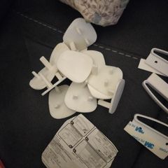 Child safety plugs and drawer safety locks