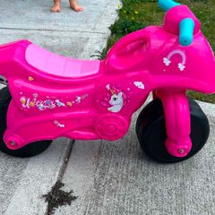 Kids ride on motorbike