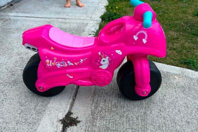 Kids ride on motorbike