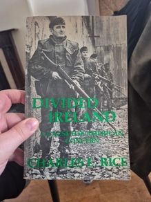 Divided Ireland: A Cause for American Concern is signed by the author Professor Charles E Rice