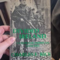 Divided Ireland: A Cause for American Concern is signed by the author Professor Charles E Rice