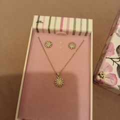 Matching silver pendant and earrings set