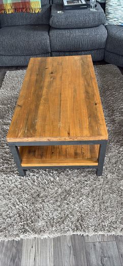 Industrial style coffee table with lower shelf