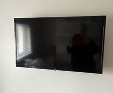 TCL Smart TV with Remote - Wall Mounted