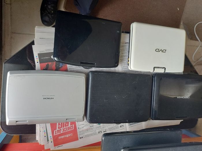 5 Portable DVD Players, all working, but no charges for them, all in very good condition