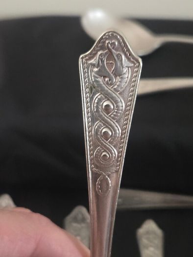 Collection of 11 Vintage Newbridge Silverware Celtic Dragon Design Spoons from Jurys Hotel
