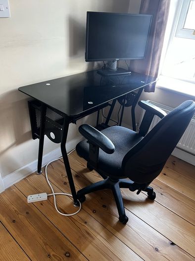 Office desk with rolling chair