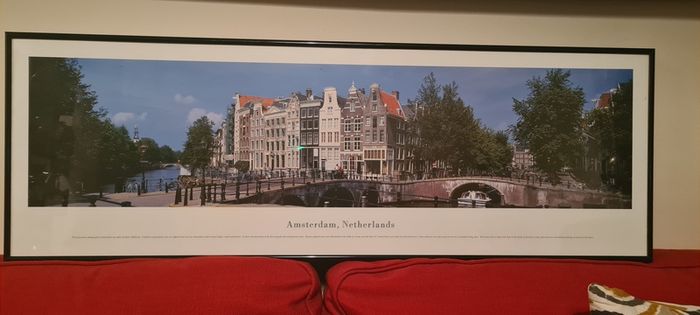 A beautiful black framed panoramic photo of Amsterdam
