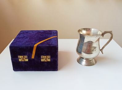 Silver plated tankard in blue velvet box