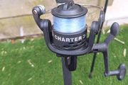 2 small fishing rods and reels