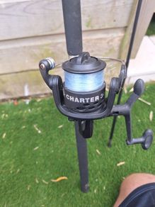 2 small fishing rods and reels