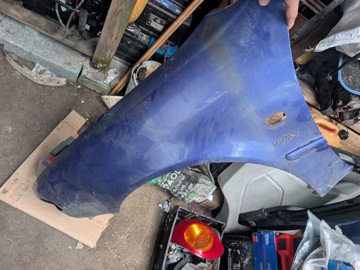 E11 Toyota Corolla front wings