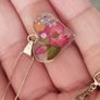Handcrafted 925 sterling silver necklace with a heart-shaped pendant featuring a floral pattern. Image 2