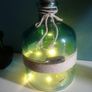 teal glass bottle with lights Image 3