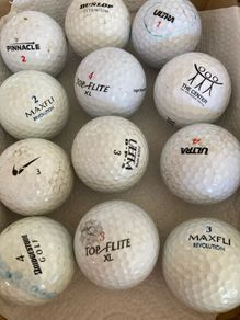 Two Dozen Used Golf Balls.