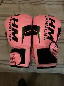 pink boxing gloves and boxing machine viral game