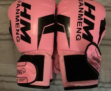 pink boxing gloves and boxing machine viral game