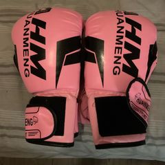 pink boxing gloves and boxing machine viral game