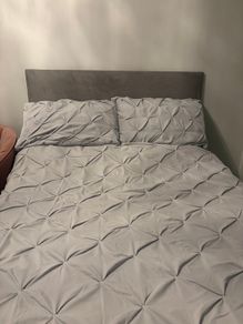 Double Divan Bed with black faux leather headboard