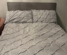 Double Divan Bed with black faux leather headboard