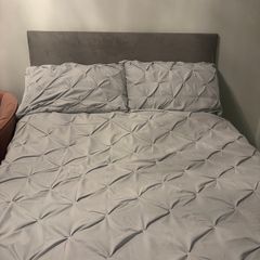 Double Divan Bed with black faux leather headboard