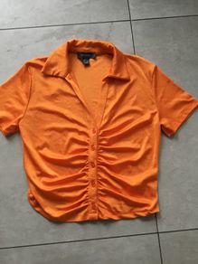 ladies Orange short sleeve top. Size S 10/12