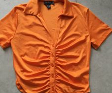 ladies Orange short sleeve top. Size S 10/12