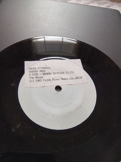 Guns of love/ Broken bicycles 7" vinyl test pressing maura o connell
