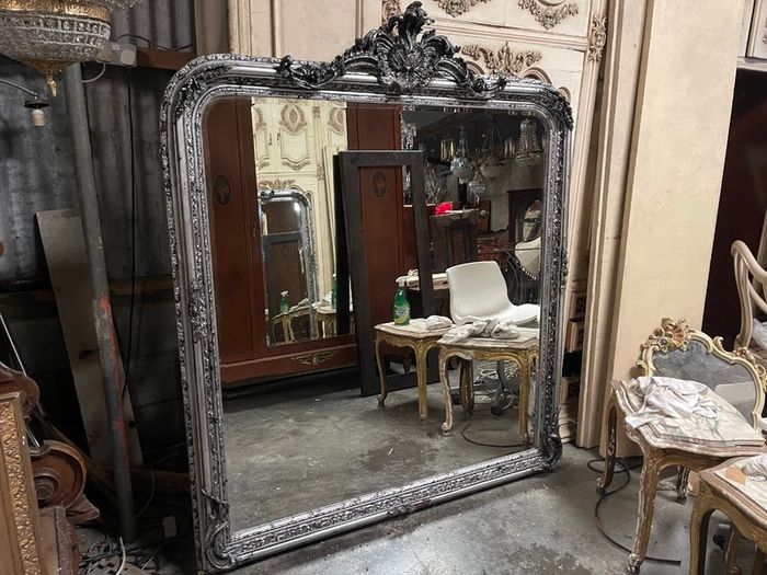 Large slightly distressed silver leaf mirror