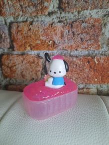 sanrio figure in bath