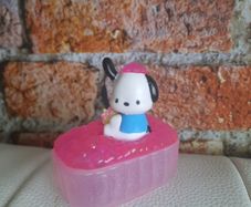 sanrio figure in bath