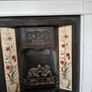 Fireplace in cast iron with wooden surround (painted white) and black marble hearth.   Perfect condition Image 3