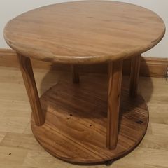 round wooden table with wheels