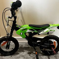 Boys green bike
