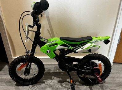 Boys green bike