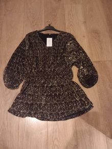 Ladies Peplum Style Black Top