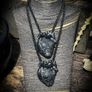 Anatomical heart made from black polymer clay with silver details on black rope Image 2