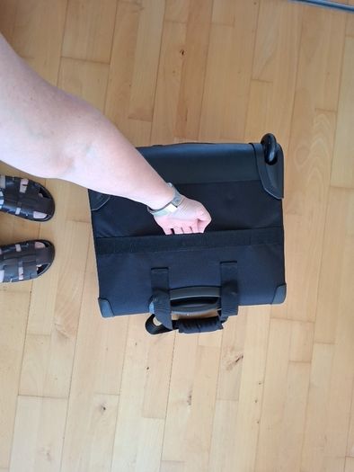 Delsey wheelie suitcase.