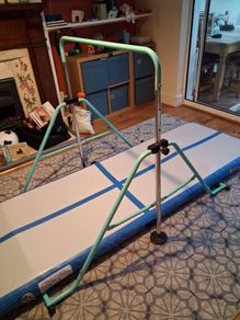 Gymnastics bar and airtrack