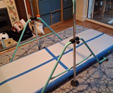 Gymnastics bar and airtrack